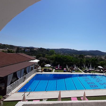 Eleni Apartments อาร์ริลลาส ภายนอก รูปภาพ